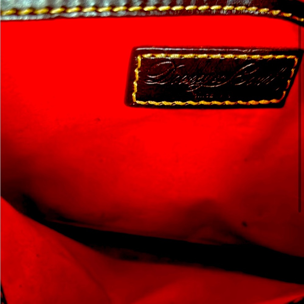 Dooney Burke Black Ostrich Skin barely used great purse like new.